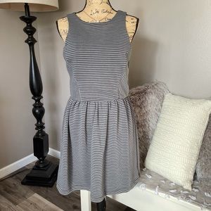 Super cute charcoal grey with black stripe sleeveless dress!